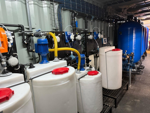 Kurmuk case-study photograph: process pipework, chemical tanks and filtration vessels