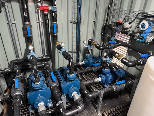Kurmuk case-study photograph: pumps and pipework